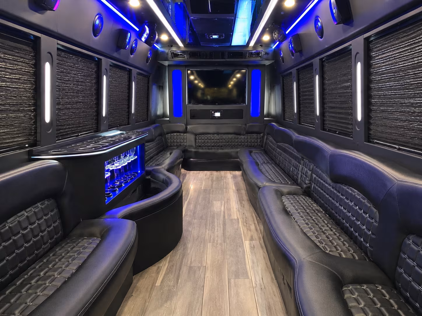 Wedding guests seated inside a party bus serving Long Beach